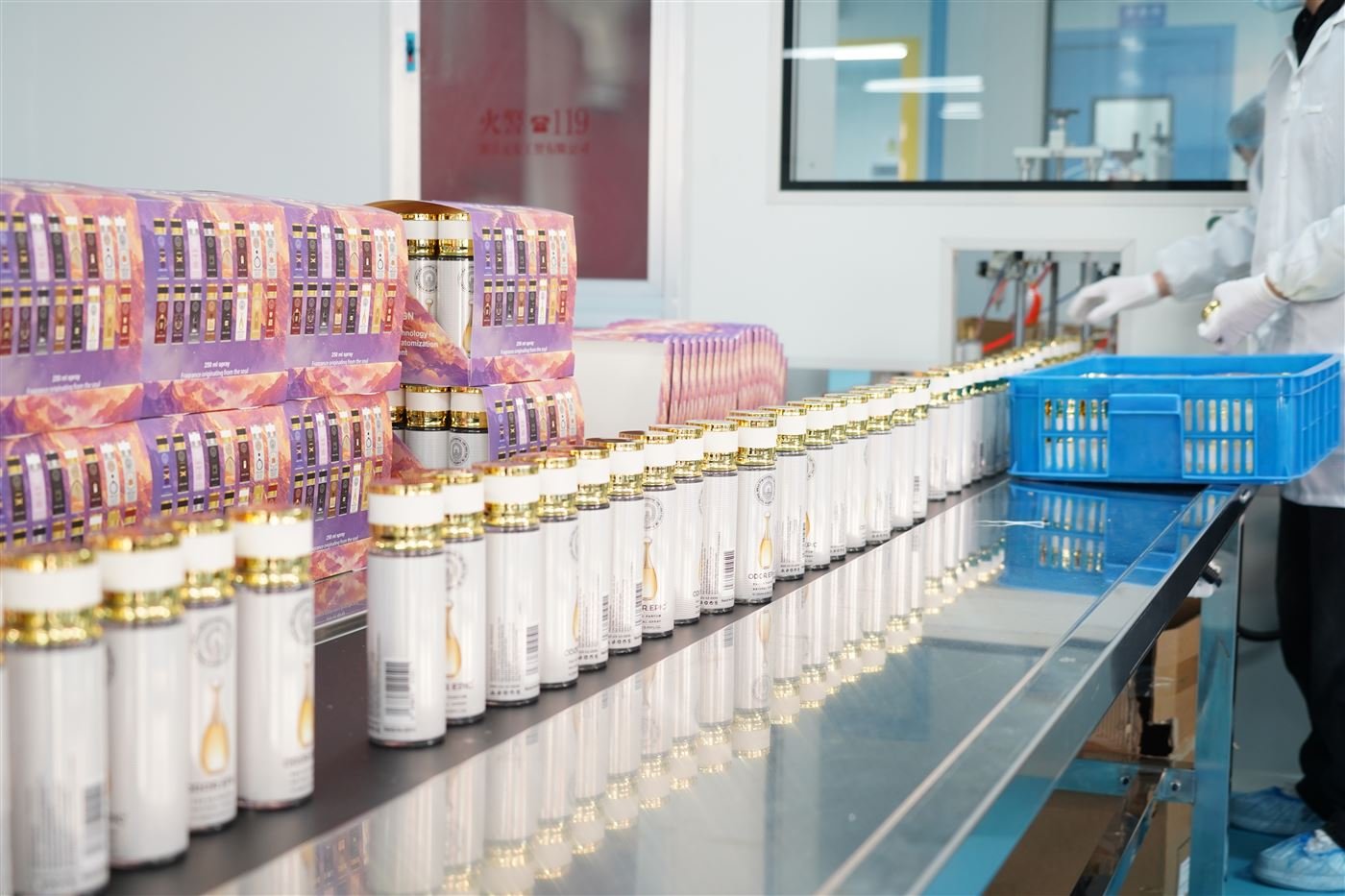 Perfume production line for bottle filling and packing
